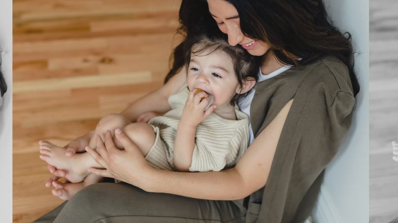 Chic black cape blazer designed for nursing mothers - the best maternity clothes available